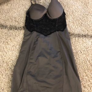 Gray spanx slip with pantie snap feature.